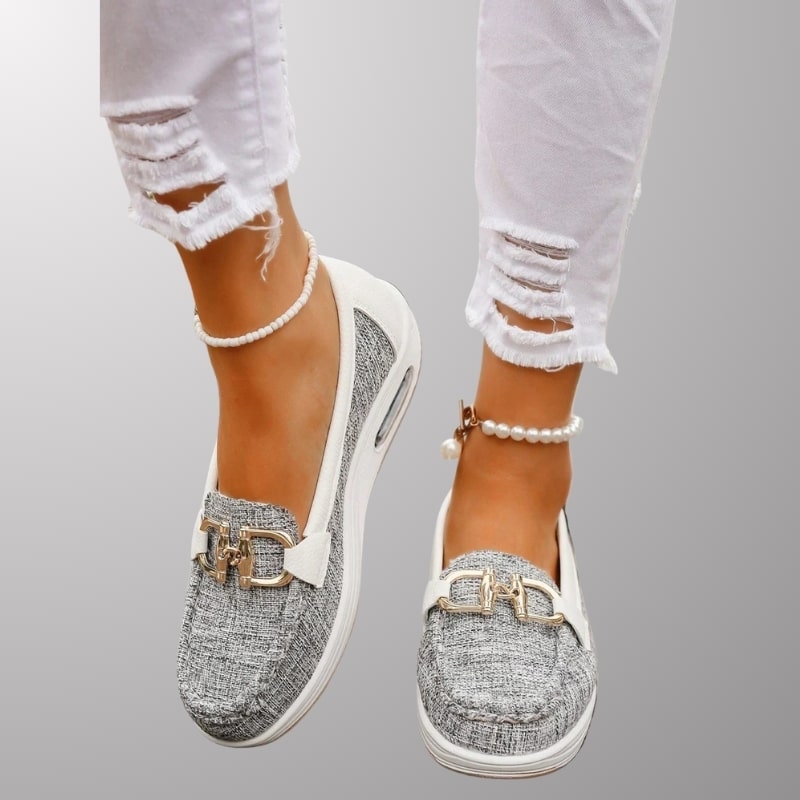 Keisha Women’s Slip-On Casual Shoes – Raised Sole Design with Polished Hardware Detail