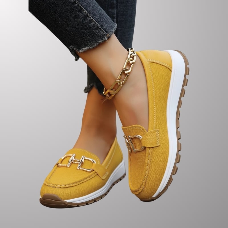 Keisha Women’s Slip-On Casual Shoes – Raised Sole Design with Polished Hardware Detail
