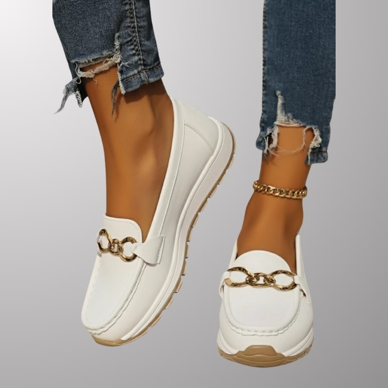 Keisha Women’s Slip-On Casual Shoes – Raised Sole Design with Polished Hardware Detail